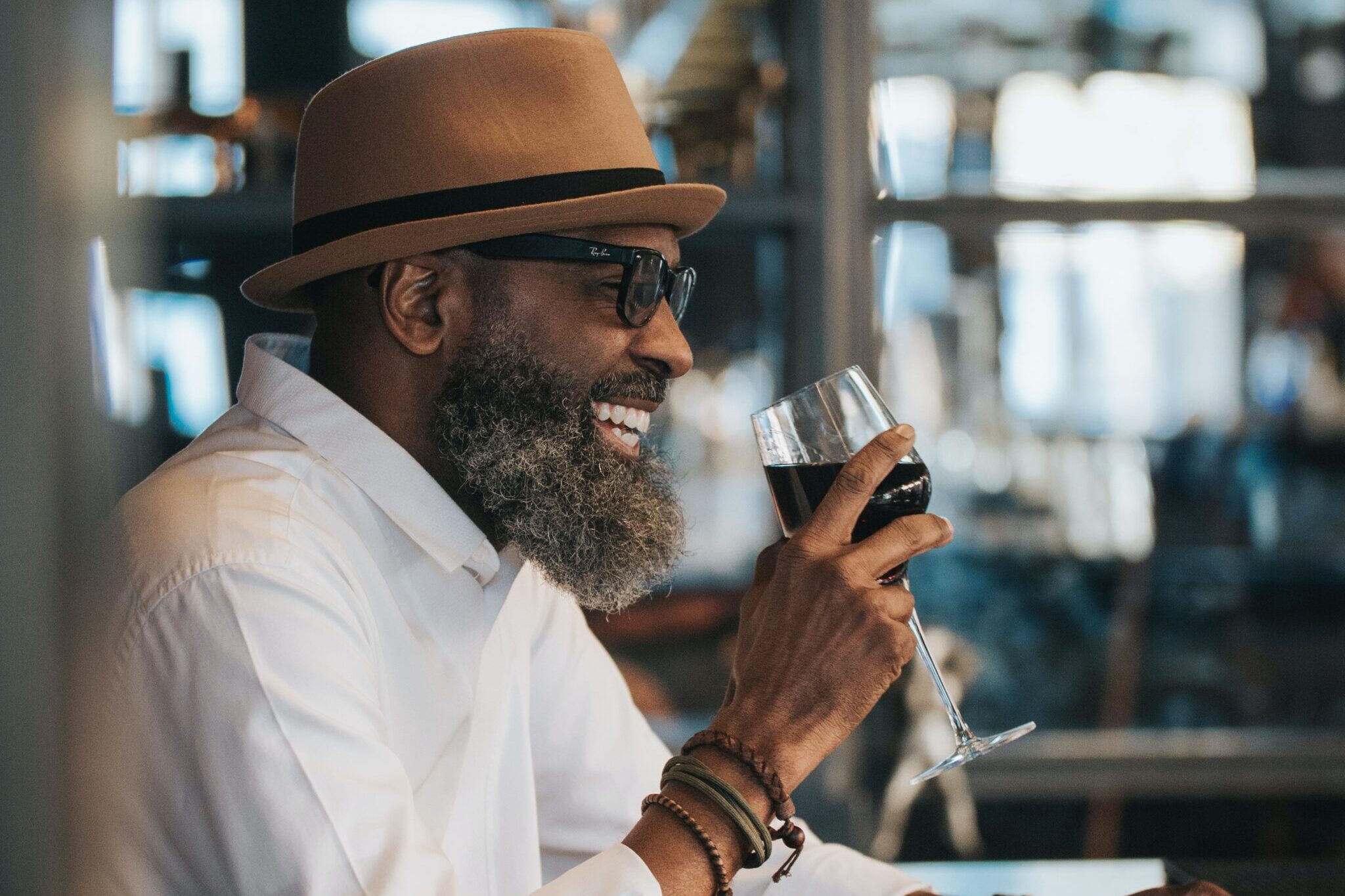 man enjoying a glass of wine